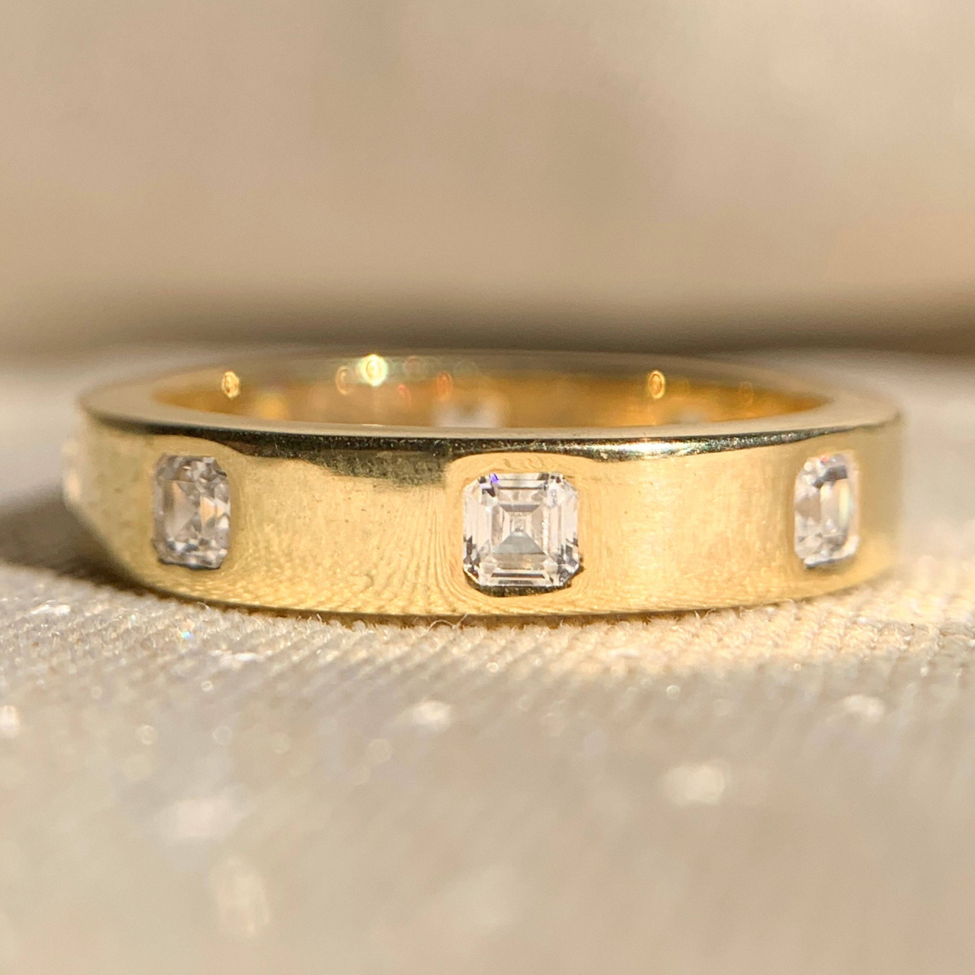 Asscher cut diamond eternity wedding band in white gold